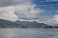 A picturesque cloud landscape over the Alps - a view from Lake Maggiore, Italy. Royalty Free Stock Photo