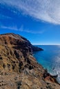 The picturesque coast of the island in the ocean. Rest on the sea.