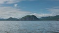 The picturesque coast of Kamchatka against the background of blue sky Royalty Free Stock Photo