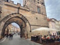 Picturesque corners of Prague. The restaurant next to the medieval tower