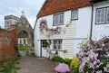 Picturesque cottage. Archway. Church