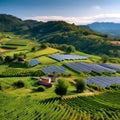 Picturesque countryside with rolling green hills and a field of solar panels nestled in the valley. with their sleek design, stand Royalty Free Stock Photo