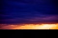 Picturesque dramatic panorama of sunset sky over dark flat skyline Royalty Free Stock Photo