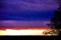 Picturesque dramatic panorama of sunset sky over dark flat skyline Royalty Free Stock Photo
