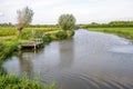 Picturesque Dutch landscape of a small river in summertime Royalty Free Stock Photo