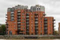 Picturesque East London buildings viewed from the Thames river