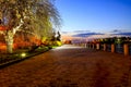 Picturesque embankment, lit by lights, in the Dnipro city at night in spring. Ukraine. Royalty Free Stock Photo