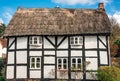 Picturesque English traditional cottage. Royalty Free Stock Photo