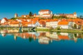 Picturesque European town reflected in the water. Ptuj, Slovenia