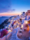 Picturesque evening landscape of Santorini island, Greece. White-washed houses by sunset
