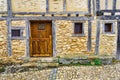 Picturesque facahada of houses made of stone in medieval style, Calatanazor, Soria. Royalty Free Stock Photo