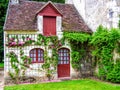 A picturesque French cottage in the village France