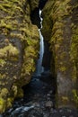 Picturesque Gljufrabui waterfall in the stone cavern autumn view, southwest Iceland