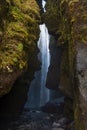 Picturesque Gljufrabui waterfall in the stone cavern autumn view, southwest Iceland