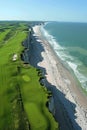 Picturesque golf course on cliffs with ocean vista and majestic rock arches for a stunning view