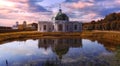 Picturesque Grotto Pavilion and its water reflection in swamped pond in Kuskovo manor park in Moscow Royalty Free Stock Photo