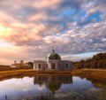 Picturesque Grotto Pavilion and its water reflection in swamped pond in Kuskovo manor park in Moscow Royalty Free Stock Photo