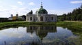 Picturesque Grotto Pavilion and its water reflection in swamped pond in Kuskovo manor park in Moscow Royalty Free Stock Photo