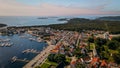 Picturesque harbor town, with a sailboats docked at the pier