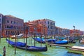Gondolas tied at Grand canal station Venice Italy Royalty Free Stock Photo