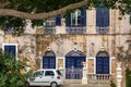 Picturesque house in Mdina, Malta, with navy blue door and windows shutters Royalty Free Stock Photo