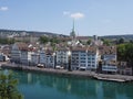 Picturesque houses on bank of Limmat river and european cityscape landscape of Zurich city in Switzerland