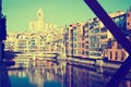 Picturesque houses and church from Eiffel bridge in Gerona. Royalty Free Stock Photo