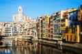 Picturesque houses and church on river Onyar in Gerona Royalty Free Stock Photo