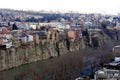 Beautiful view on top of the house on the edge of the cliff of the Kura river in Tbilisi Royalty Free Stock Photo