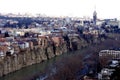 Beautiful view on top of the house on the edge of the cliff of the Kura river in Tbilisi Royalty Free Stock Photo