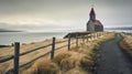 Icelandic style church sits in fenced field, in windswept landscape