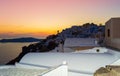 Picturesque Imerovigli resort village at sunset Santorini island Greece