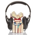 Picturesque installation of mini-books and round headphones as an audiobook concept, Russia Royalty Free Stock Photo