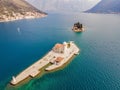 Picturesque island st. George and temple Gospa od Skrpela. Drone view. Boka Kotor Bay, Perast, Montenegro. Ancient Royalty Free Stock Photo