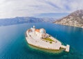 Picturesque island st. George and temple Gospa od Skrpela. Drone view. Boka Kotor Bay, Perast, Montenegro. Ancient Royalty Free Stock Photo