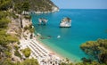 Picturesque Italian seascape with the Rocks of Faraglioni di Puglia in the Adriatic sea bay of Baia Delle Zagare - Mattinata, Royalty Free Stock Photo