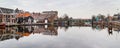 Picturesque landscape with beautiful traditional houses reflection in canal, Haarlem, Holland