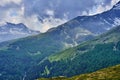 Picturesque landscape featuring a bright blue sky over the Splugen Pass in the Alps