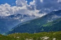 Picturesque landscape featuring a bright blue sky over the Splugen Pass in the Alps