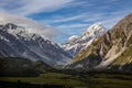 snow covered mountains on a sunny day in new zealand, Royalty Free Stock Photo