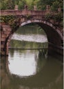 Picturesque landscape featuring a stunning historic Chinese bridge in a tranquil setting