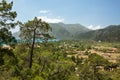 Picturesque landscape overlooking village Cirali, surrounded by mountains on Mediterranean coast. Walking route along Lycian Way.