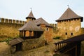 Picturesque landscape view of courtyard with ancient stone buildings in the medieval castle Royalty Free Stock Photo