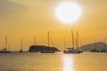 Picturesque majestic luxury Mediterranean sea bay shore line scenic view rocky cliffs above water and yacht silhouettes in vivid Royalty Free Stock Photo