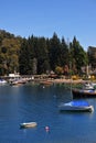 picturesque manzano bay, with luxurious hotels and apartments with docks and boats on lake nahuel h