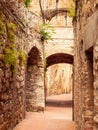 Picturesque medieval narrow street of San Gimignano old town, Tuscany, Italy Royalty Free Stock Photo