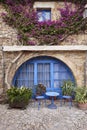 Picturesque medieval village of Peratallada. Blue arcade. Costa Brava. Spain Royalty Free Stock Photo