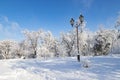 A picturesque Monastery Island winter landscape, park covered with snow, with a beautiful lantern in the Dnipro city