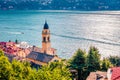 Picturesque morning cityscape of Laglio town with spire of S.Giorgio church, Province of Como, Lombardy region, Italy, Europe. Su Royalty Free Stock Photo