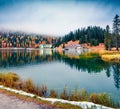 Picturesque morning scene of Misurina lake in National Park Tre Cime di Lavaredo. Colorful autumn view of Dolomite Alps, South Royalty Free Stock Photo